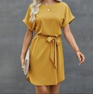 Yellow tunic blouse with belt